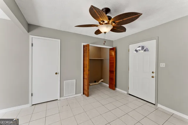 a kitchen with a refrigerator sink and stove