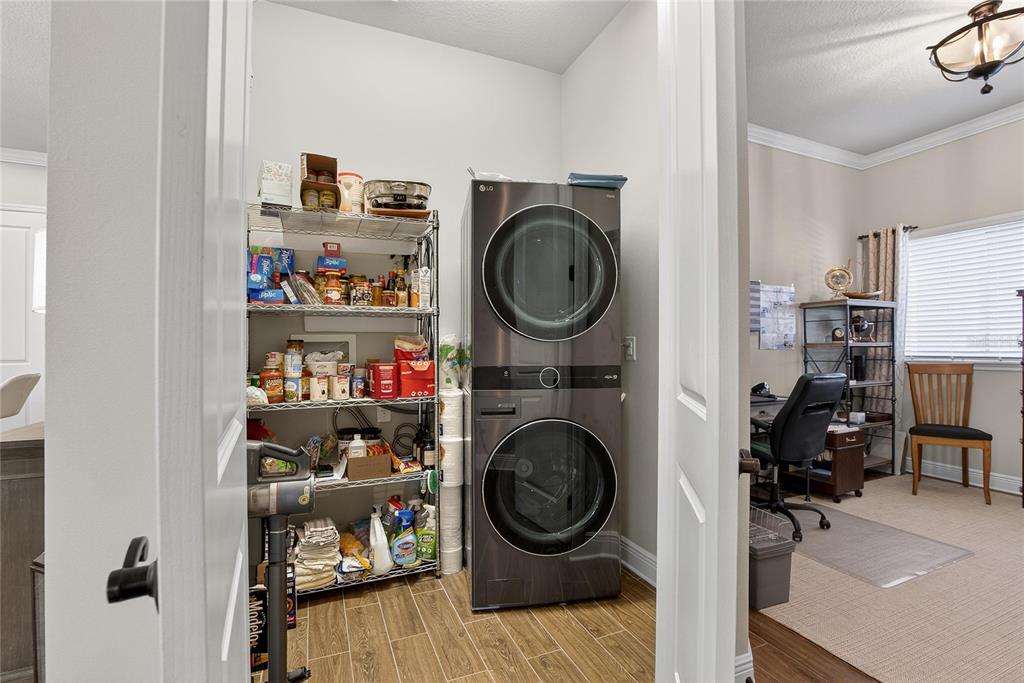 6020 Plover Meadow Street Lithia, FL 33547 - Photo 18 of 41 a view of living room washer and dryer