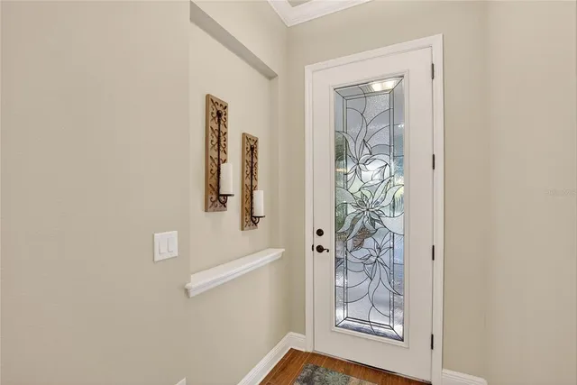 a view of a hallway with windows