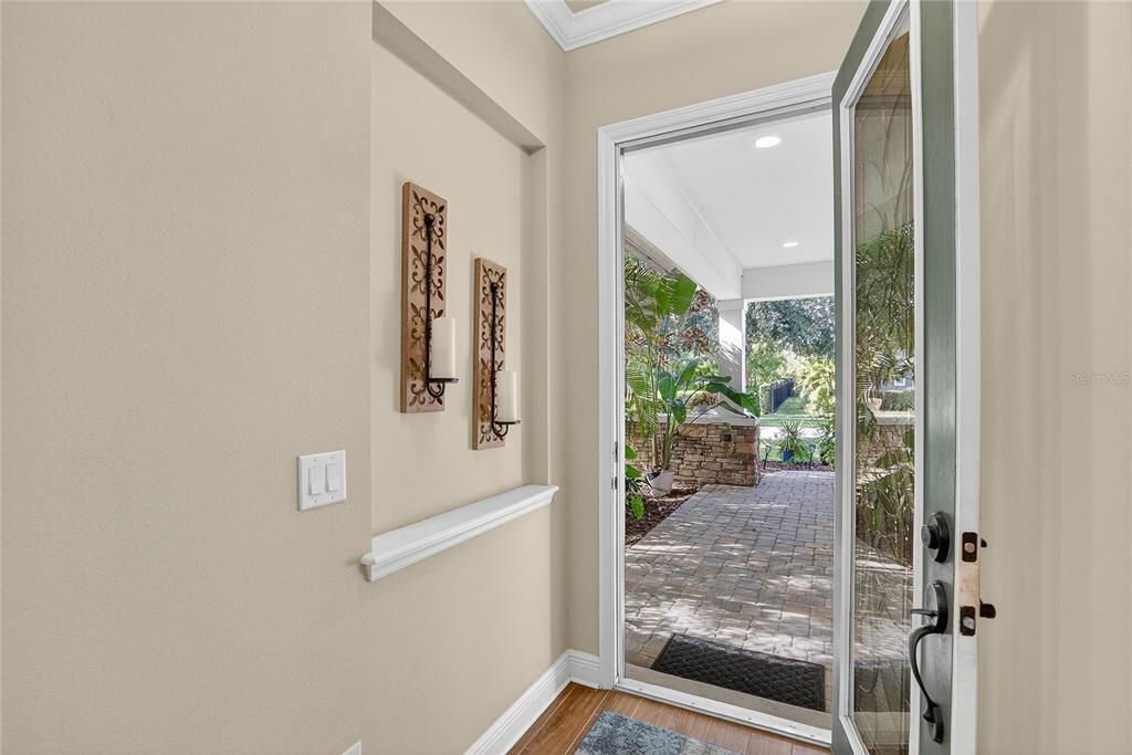 6020 Plover Meadow Street Lithia, FL 33547 - Photo 4 of 41 a view of a hallway with windows
