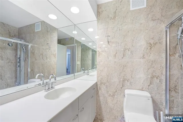 a view of staircase with a small yard