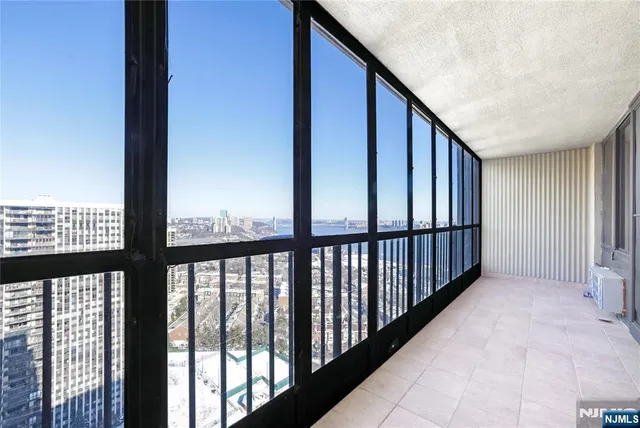 a view of a city with ocean