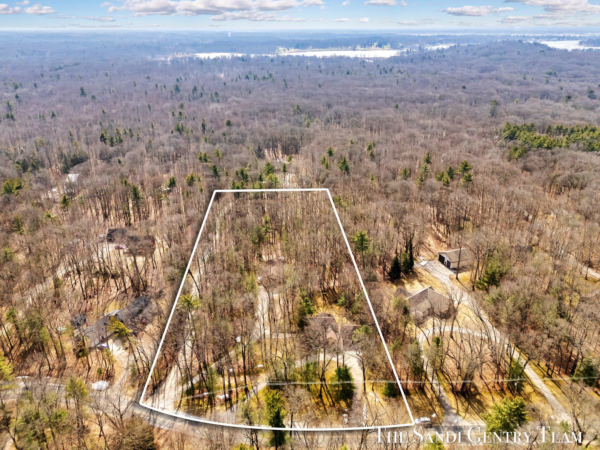 15212 Hickory Street Spring Lake, MI 49456 - Photo 3 of 53 04-DJI_20250314132220_0586_D-Edit
