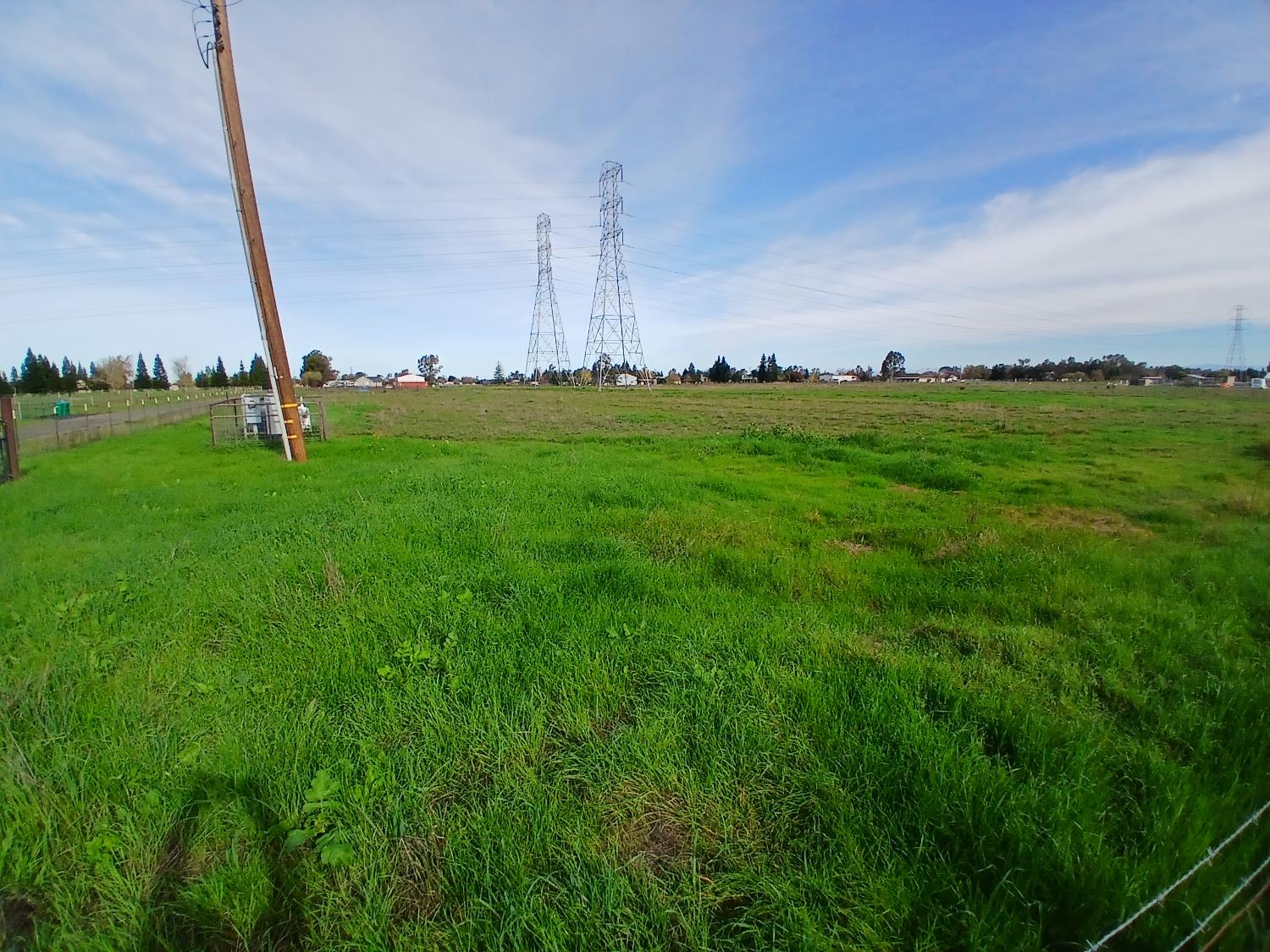 12291 Hobday Road Wilton, CA 95693 - Photo 11 of 14 a view of a city with lush green space