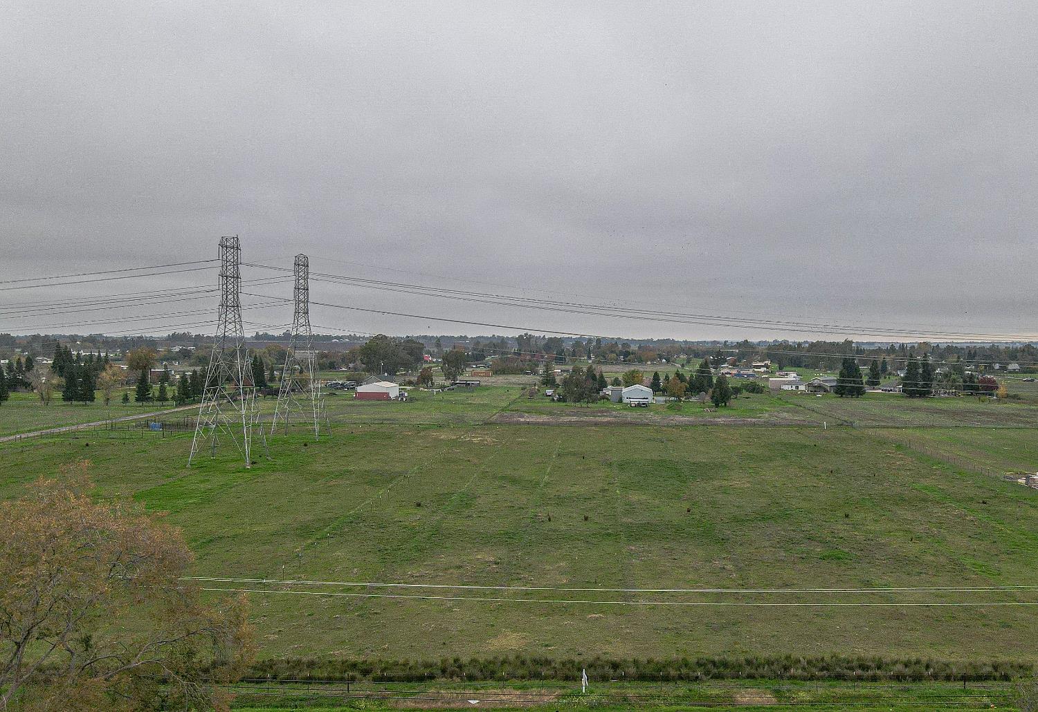 12291 Hobday Road Wilton, CA 95693 - Photo 3 of 14 a view of a green field