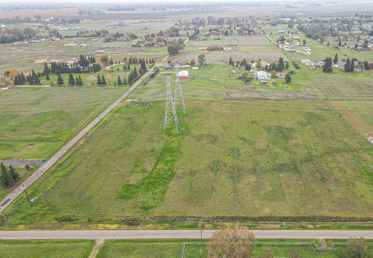 12291 Hobday Road Wilton, CA 95693 - Photo 5 of 14 a view of a lake with a mountain