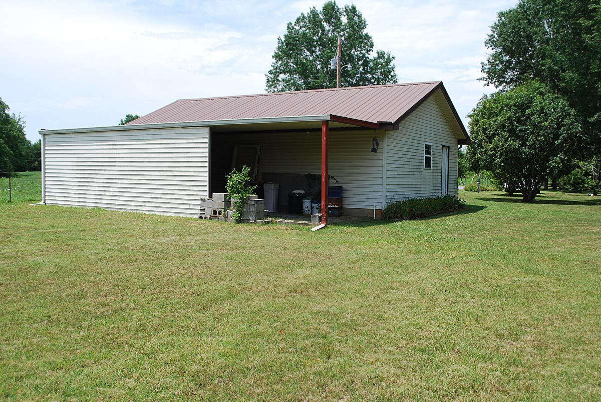 178 Taylor Road Rockvale, TN 37153 - Photo 13 of 25 a view of a house with backyard and garden