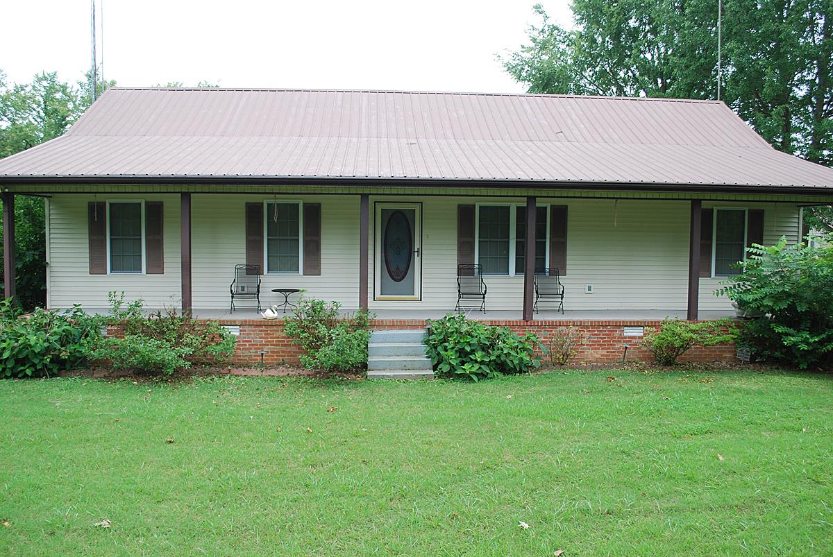 178 Taylor Road Rockvale, TN 37153 - Photo 22 of 25 a front view of a house with garden and porch