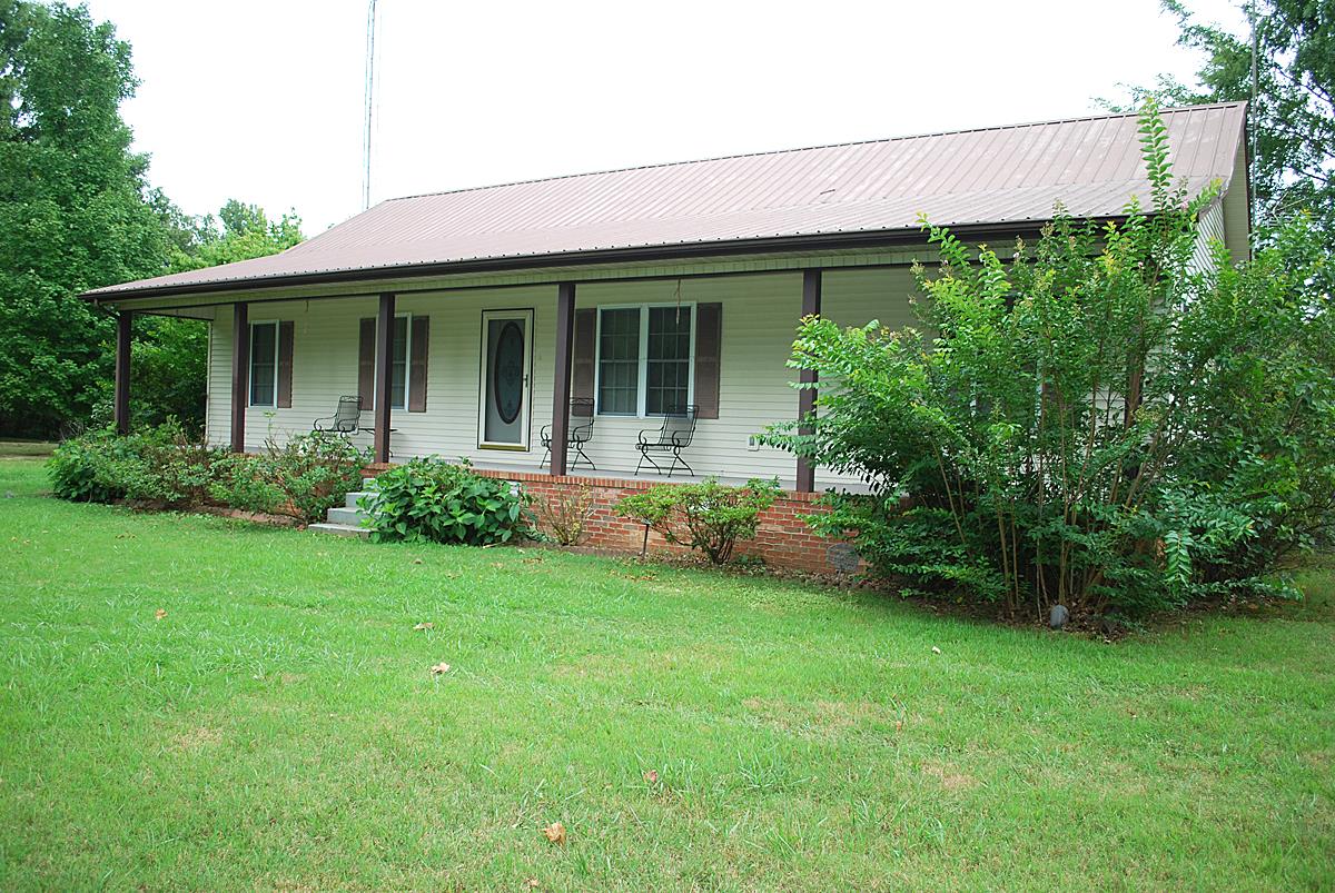 178 Taylor Road Rockvale, TN 37153 - Photo 23 of 25 a front view of a house with garden