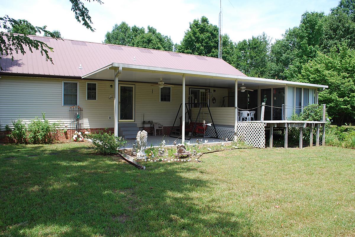 178 Taylor Road Rockvale, TN 37153 - Photo 9 of 25 a view of a house with backyard porch and sitting area