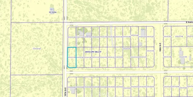 a view of a large window with a small yard