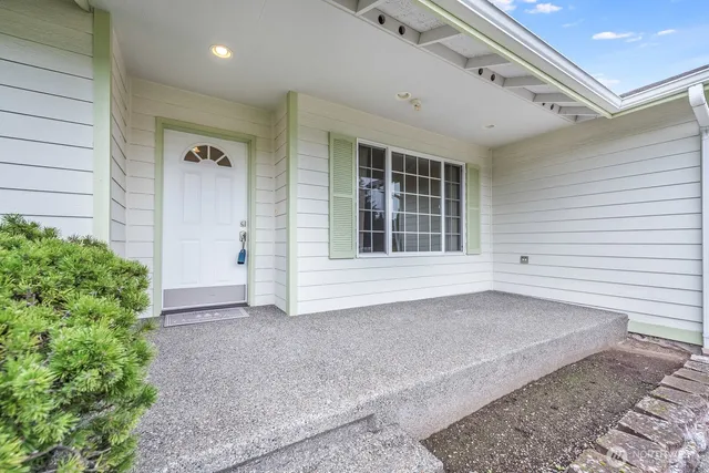 an aerial view of a house with a garden