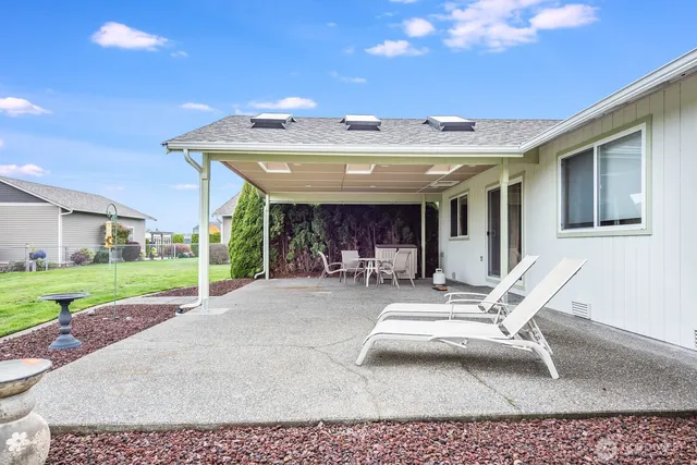 a kitchen with stainless steel appliances a refrigerator sink and cabinets