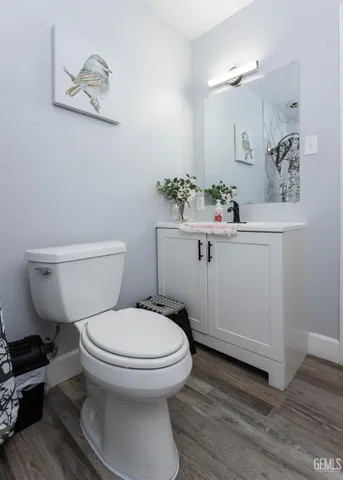 a room with furniture and mirror