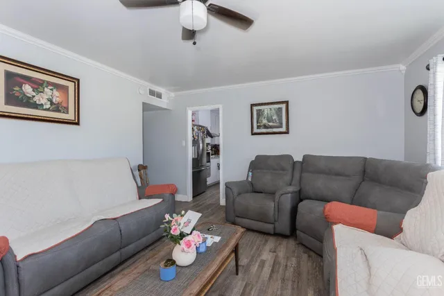a living room with furniture and a couch