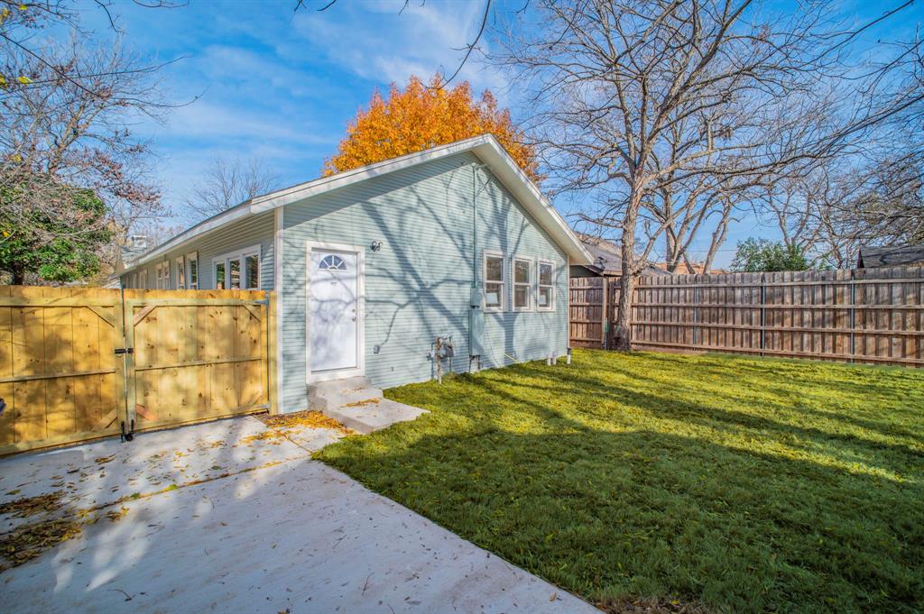 5914 Victor Street Dallas, TX 75214 - Photo 29 of 32 a view of a backyard with a garden