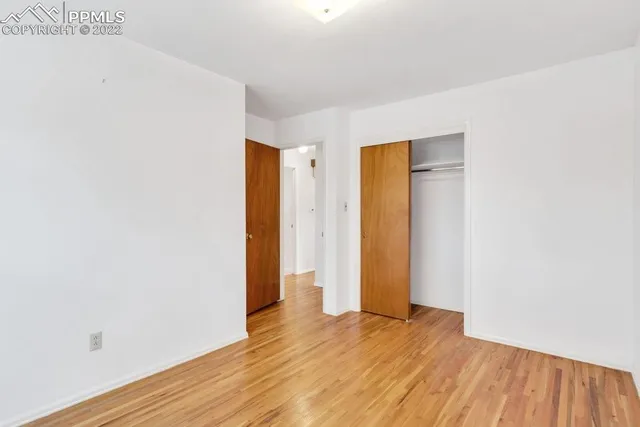 a bathroom with a sink a mirror and a shower