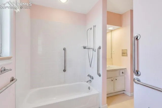 a view of a livingroom with an empty space and a window