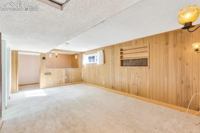 a view of a town with large trees