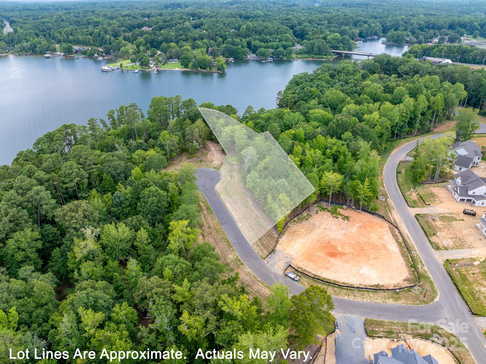 1006 Kingbird Lane Clover, SC 29710 - Photo 3 of 41 an aerial view of a house with a yard and lake view