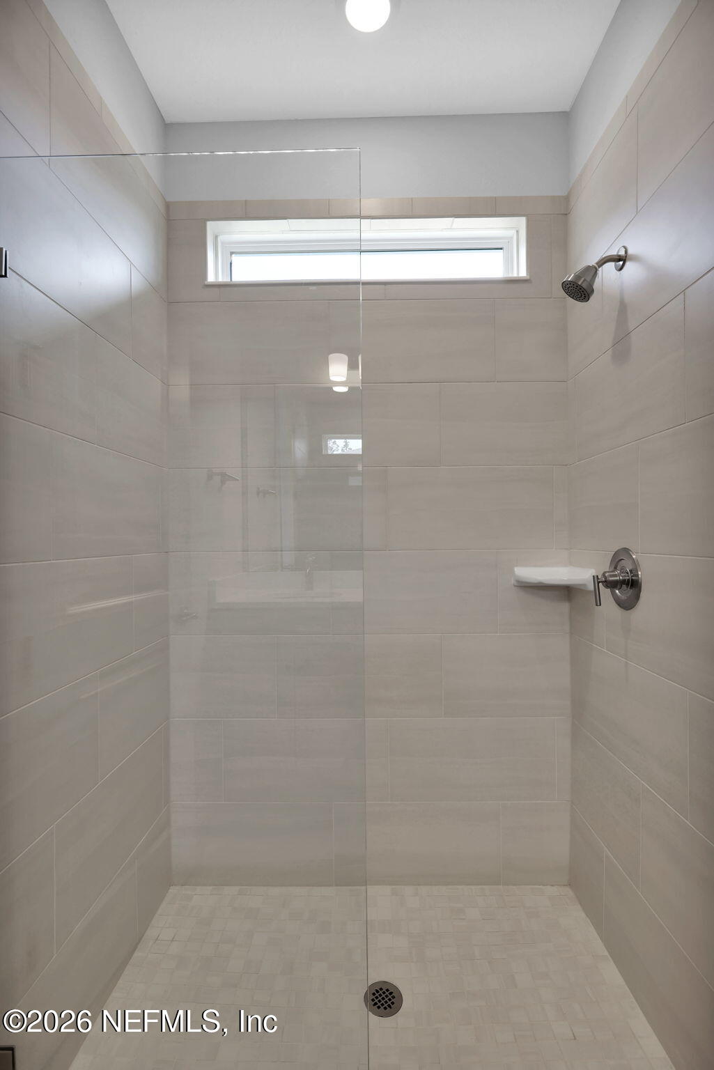 860 Rooster Holw Way Middleburg, FL 32068 - Photo 16 of 26 a bathroom with a shower