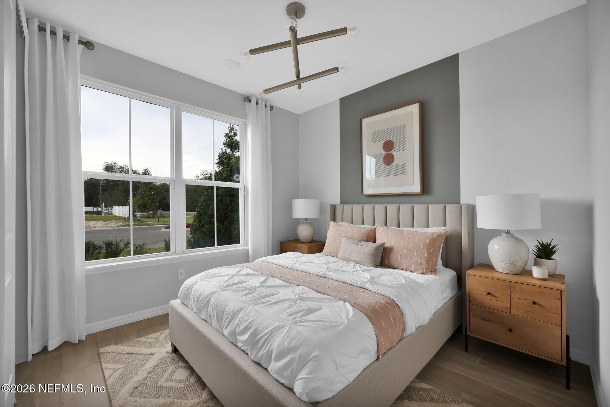 860 Rooster Holw Way Middleburg, FL 32068 - Photo 17 of 26 a bedroom with a large bed and a window
