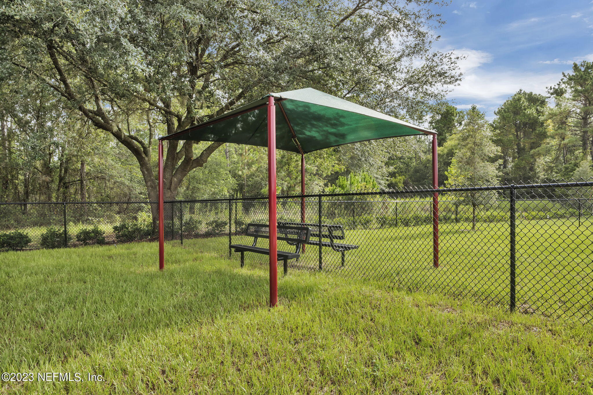 860 Rooster Holw Way Middleburg, FL 32068 - Photo 23 of 26 a view of park with a slide