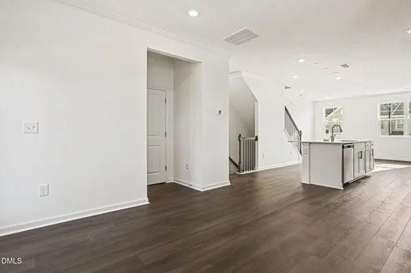 a view of a livingroom with wooden floor