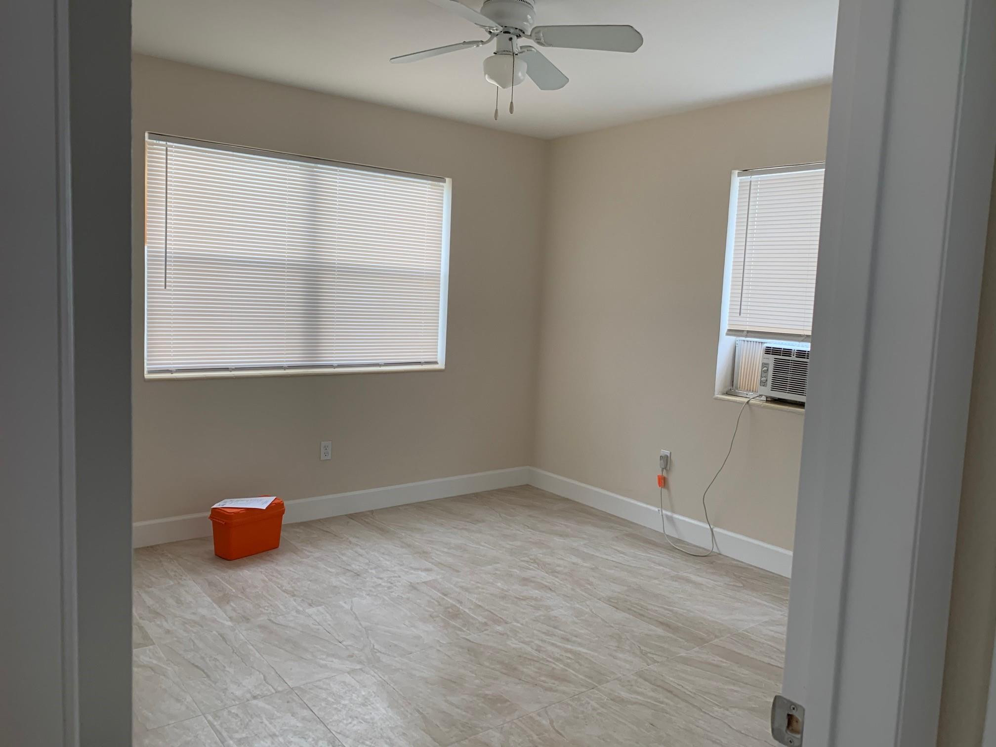 1575 Southwest 2nd Street, Unit 1 Miami, FL 33135 - Photo 8 of 10 an empty room with a window