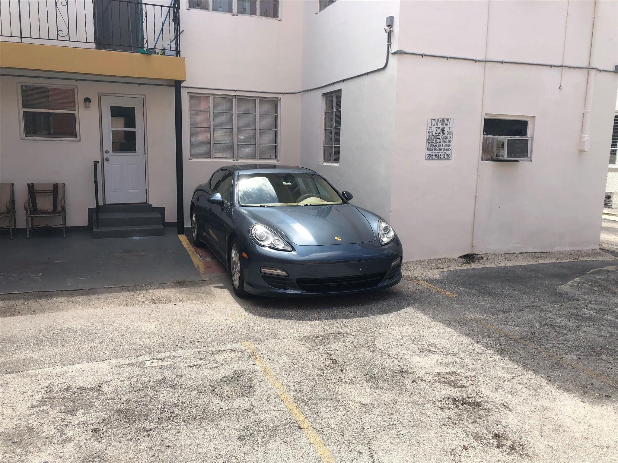 1575 Southwest 2nd Street, Unit 1 Miami, FL 33135 - Photo 10 of 10 a car parked in front of house