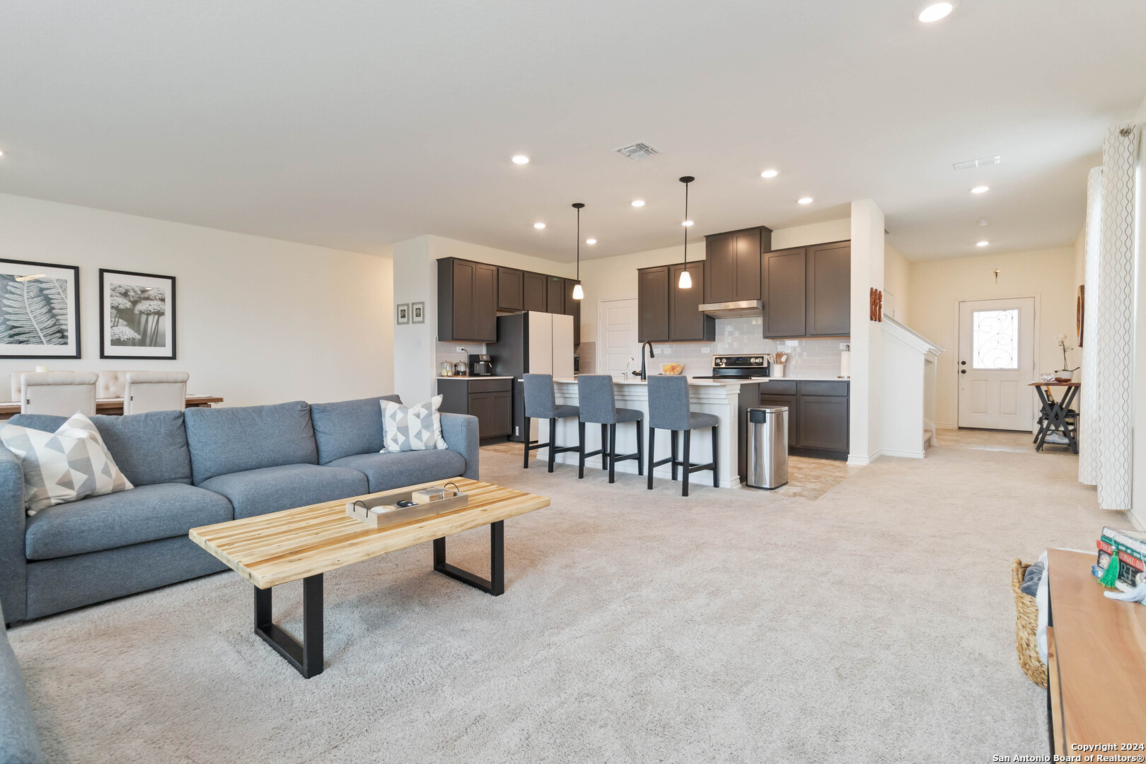 6611 Runaway Row Converse, TX 78109 - Photo 4 of 30 a living room with furniture and a table