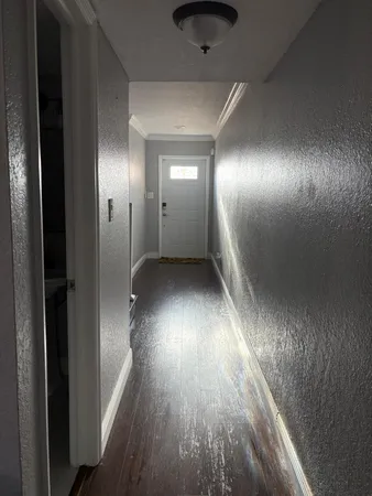 a bathroom with a sink toilet and a mirror