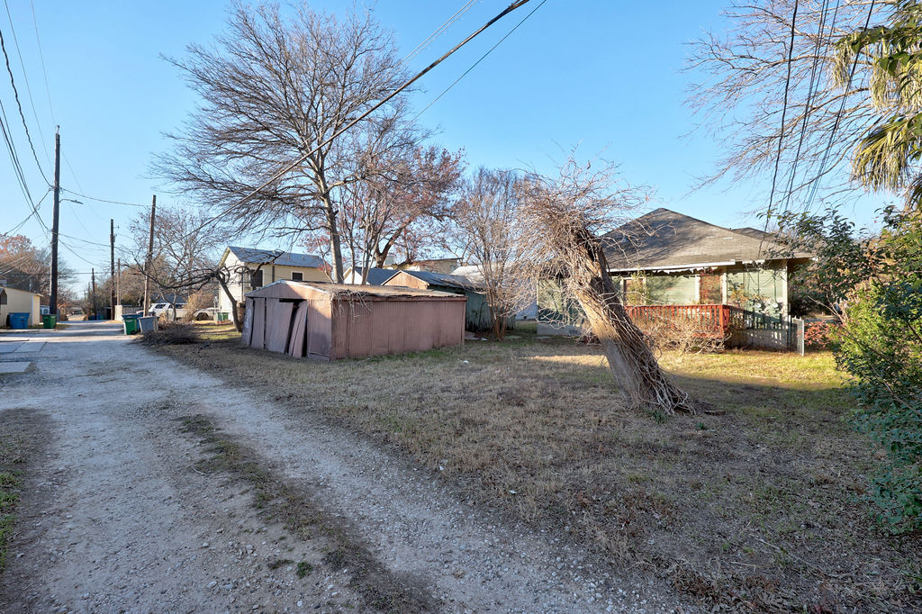 809 East 45th 1/2 Street Austin, TX 78751 - Photo 8 of 9 View of dirt / gravel road with a residential view