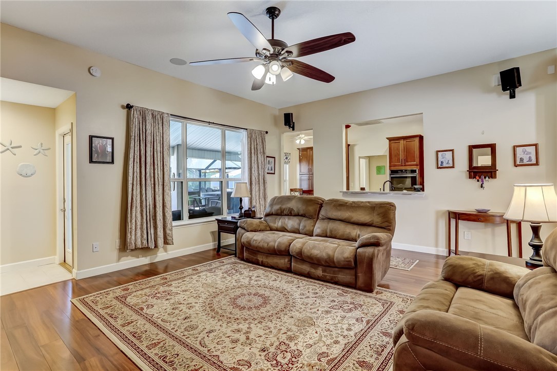 96356 Chester Road Yulee, FL 32097 - Photo 12 of 34 a living room with furniture and a rug