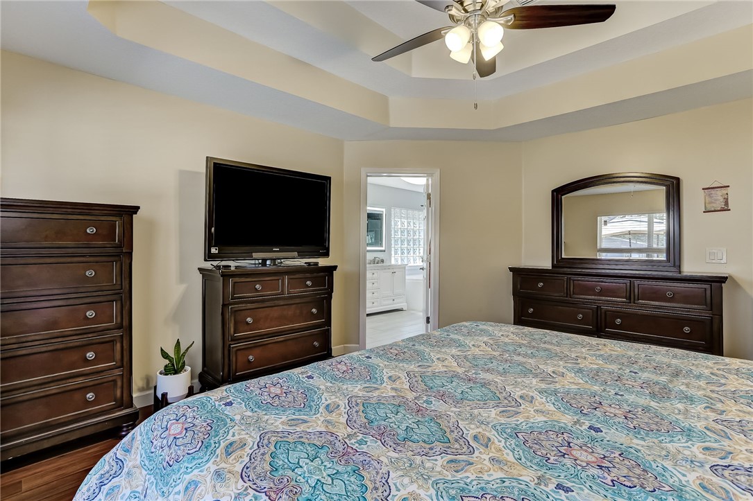 96356 Chester Road Yulee, FL 32097 - Photo 21 of 34 a bedroom with a bed and a television