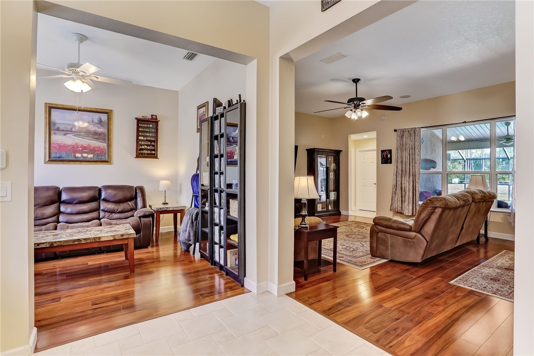 96356 Chester Road Yulee, FL 32097 - Photo 8 of 34 a living room with furniture and wooden floor