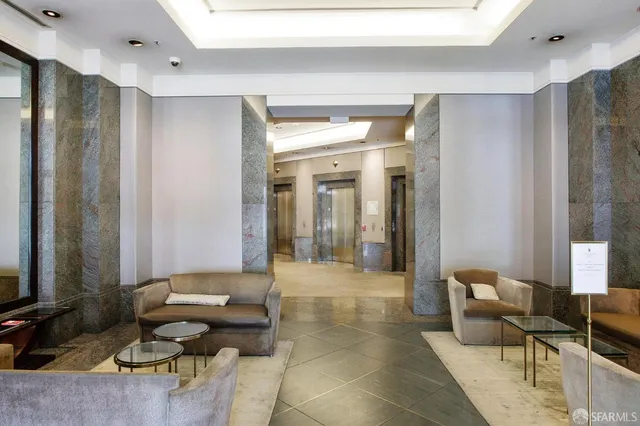 a view of a pathway with a bench in backyard