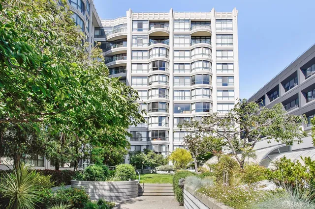 a room with gym equipment and a table