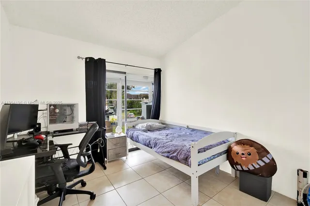 a bedroom with furniture and a bed