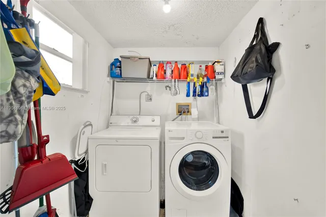 an aerial view of a house with a yard and garden