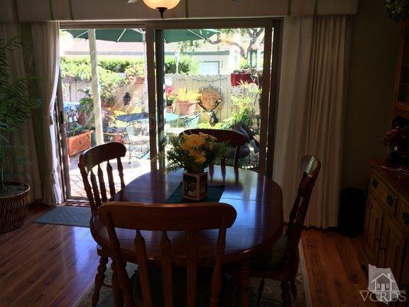 424 Reed Way Port Hueneme, CA 93041 - Photo 23 of 68 a view of a dining room with furniture window and wooden floor
