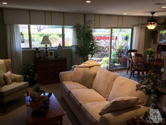 424 Reed Way Port Hueneme, CA 93041 - Photo 33 of 68 a living room with furniture a lamp and potted plants