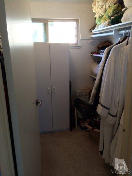 424 Reed Way Port Hueneme, CA 93041 - Photo 36 of 68 a view of walk in closet with clothes and shoes