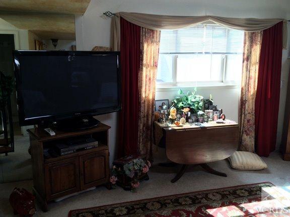 424 Reed Way Port Hueneme, CA 93041 - Photo 60 of 68 a room with wooden floor and a table