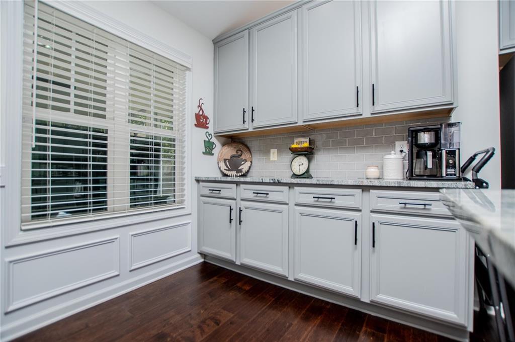 142 Lawrence Drive Villa Rica, GA 30180 - Photo 18 of 80 a kitchen with stainless steel appliances granite countertop a sink and a cabinets