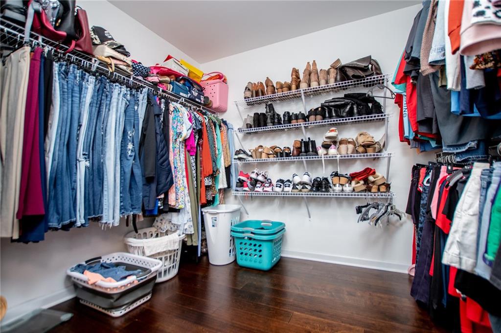 142 Lawrence Drive Villa Rica, GA 30180 - Photo 45 of 80 a view of walk in closet with clothes and shoes