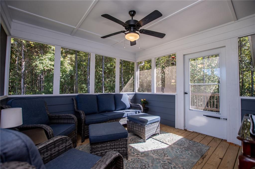 142 Lawrence Drive Villa Rica, GA 30180 - Photo 62 of 80 a living room with furniture and a large window