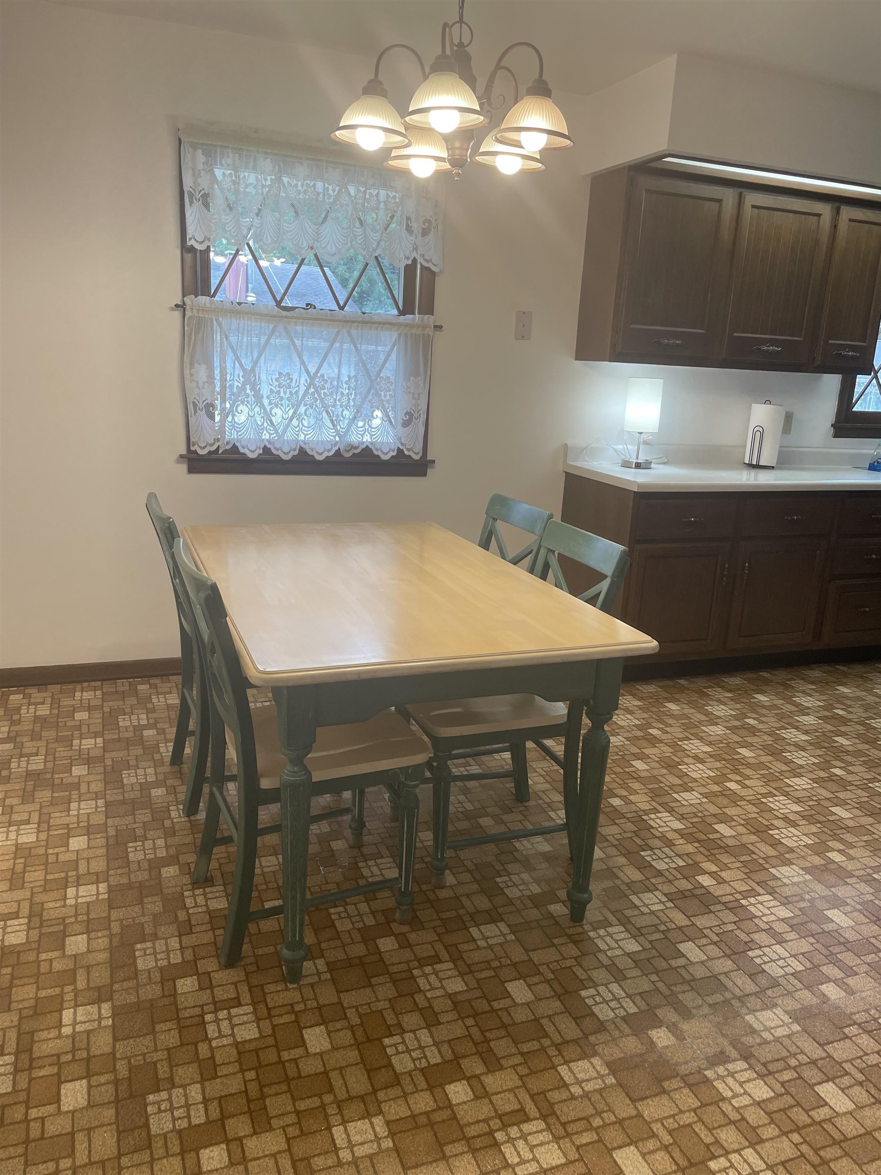 109 Division Street Hanover, IL 61041 - Photo 13 of 28 a view of a dining room with furniture
