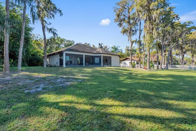a view of a house with a big yard