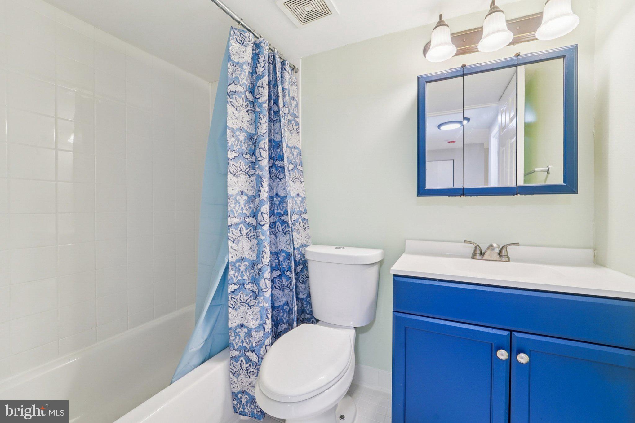 9432 Merryrest Road, Unit AB Columbia, MD 21045 - Photo 21 of 37 a bathroom with a toilet a sink and a bathtub